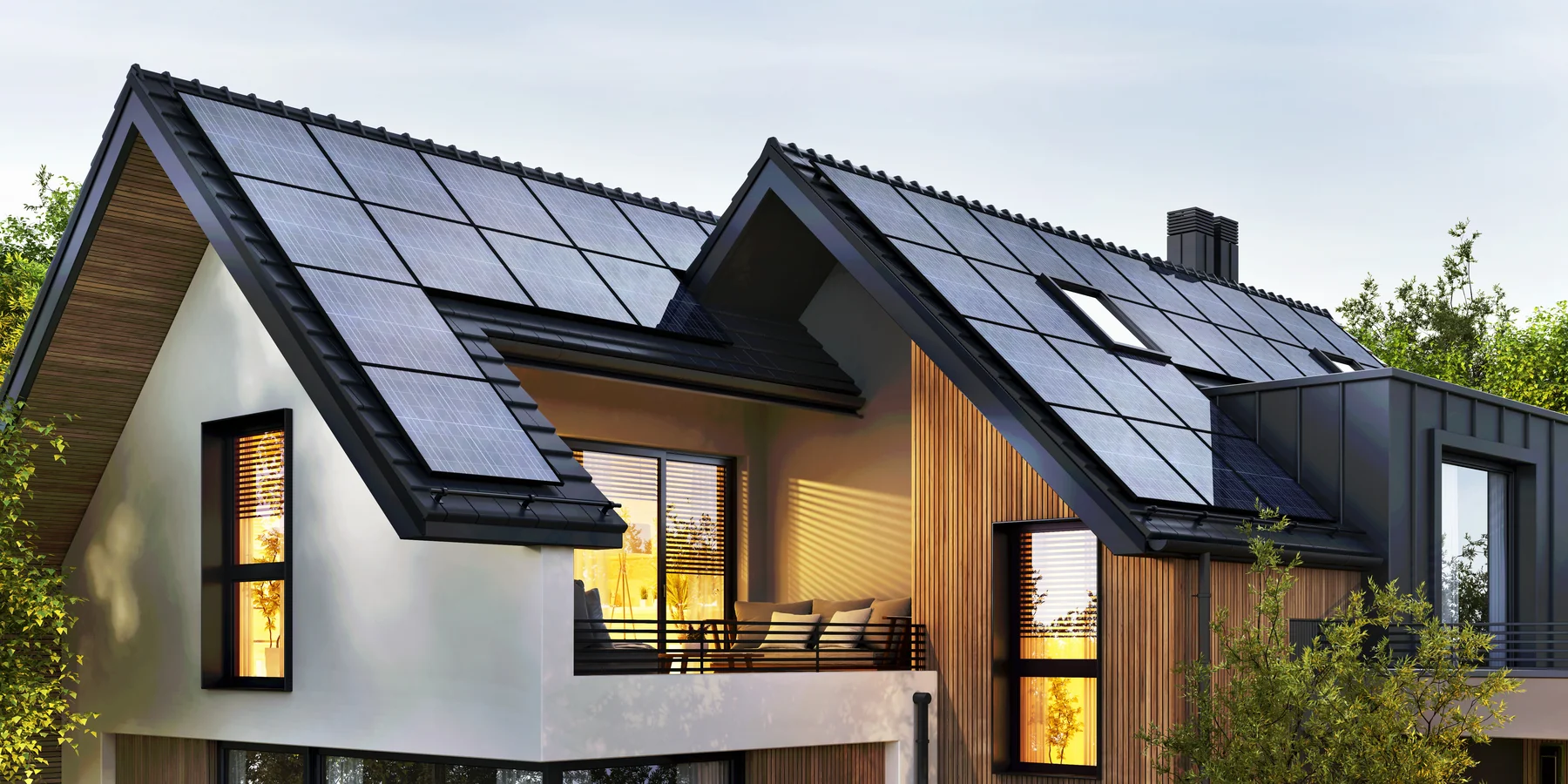 Solar panels fitted to the pitched roof of a contemporary home.